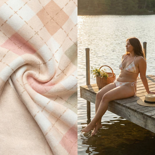 Close-up of quilted fabric and a woman in a bikini sitting on a dock by a lake.