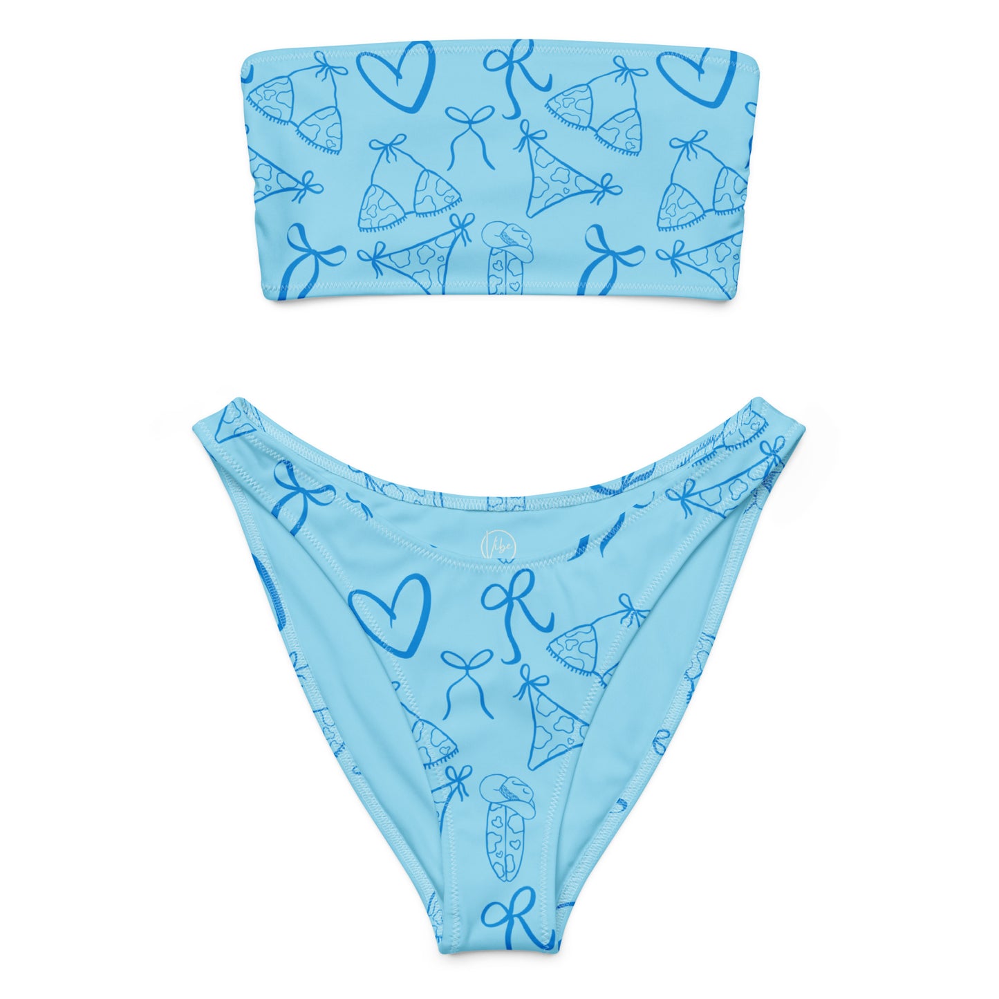 Woman wearing the Vibewear 'Blue Crush' bandeau bikini set, which features a vibrant blue abstract pattern, a strapless top, and flattering high-leg bottoms.