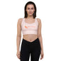 Model wearing Keep It Spicy recycled longline sports bra with slogan print front view