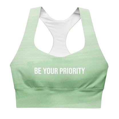 Be Your Priority recycled longline sports bra showing slogan text and wide support band