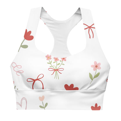 Close up of Sweet Tied Blooms recycled longline sports bra showing floral pattern and wide support band