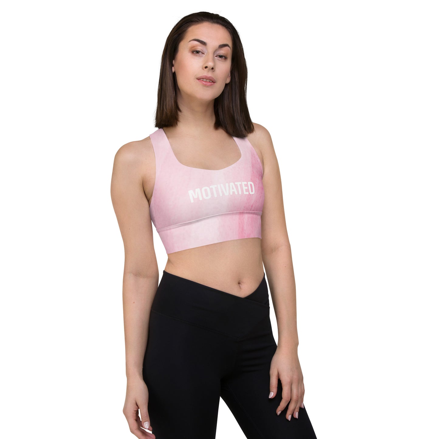Model wearing Motivated recycled longline sports bra in pink front view