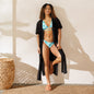 Model wearing Ocean Kiss recycled string bikini set styled with black cover up