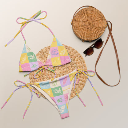 Pastel Patchwork Splash recycled string bikini laid flat showing pastel patchwork print