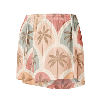 Front side view Vibewear 'Sunset Palm Mosaic' satin pajama shorts, showing the blue and orange geometric pattern and relaxed fit.