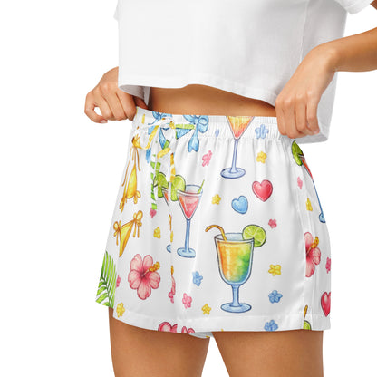 Close up of model wearing Summer Spritz womens pajama shorts showing elastic waistband and summer print