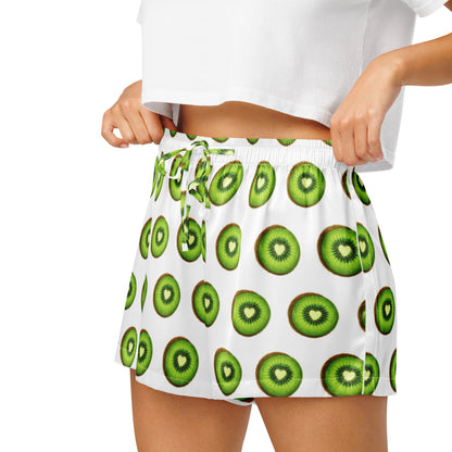 Close up of model wearing Kiwi Crush womens pajama shorts showing elastic waistband and kiwi fruit print