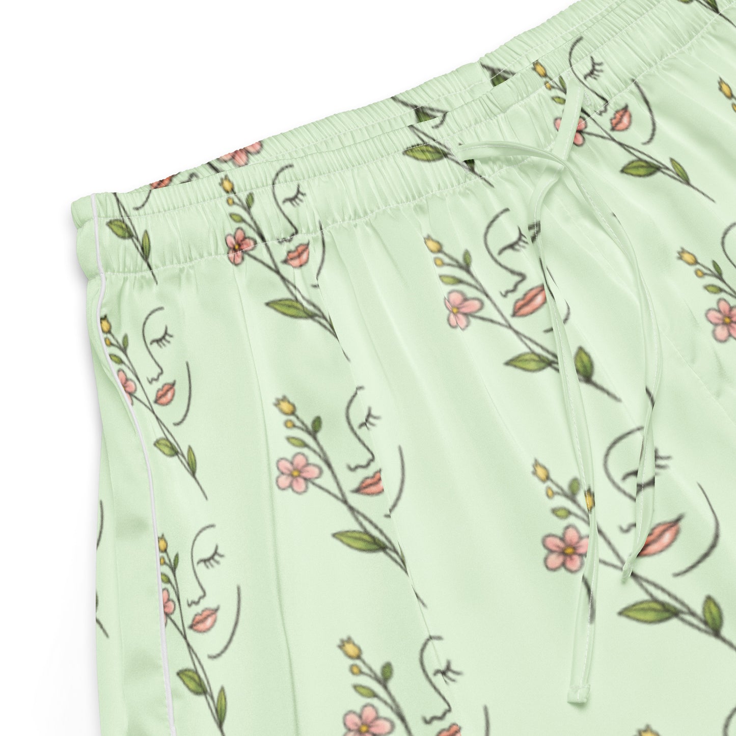 Close up of Mint Meadow Dreams womens pajama shorts fabric with delicate floral pattern
