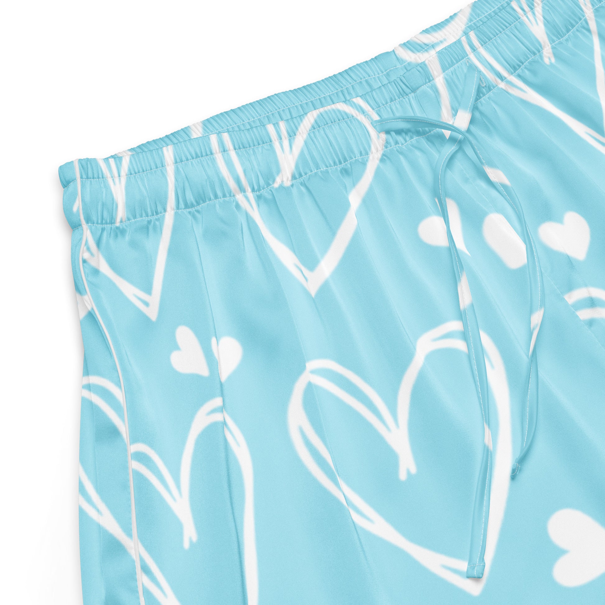 Close up of Sweetheart Skies womens pajama shorts fabric with blue heart pattern