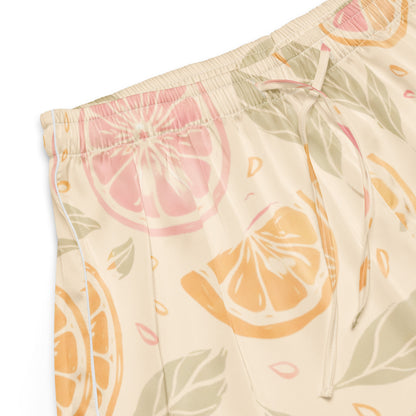 Close up of Citrus Glow womens pajama shorts fabric with orange and citrus slice pattern