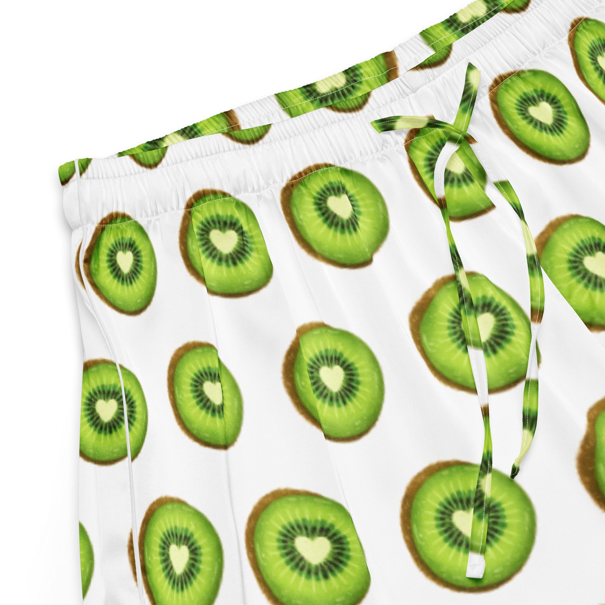 Close up of Kiwi Crush womens pajama shorts fabric with green kiwi pattern