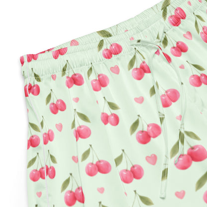 Close up of Cherry Sweet Dreams womens pajama shorts fabric with pink cherry pattern