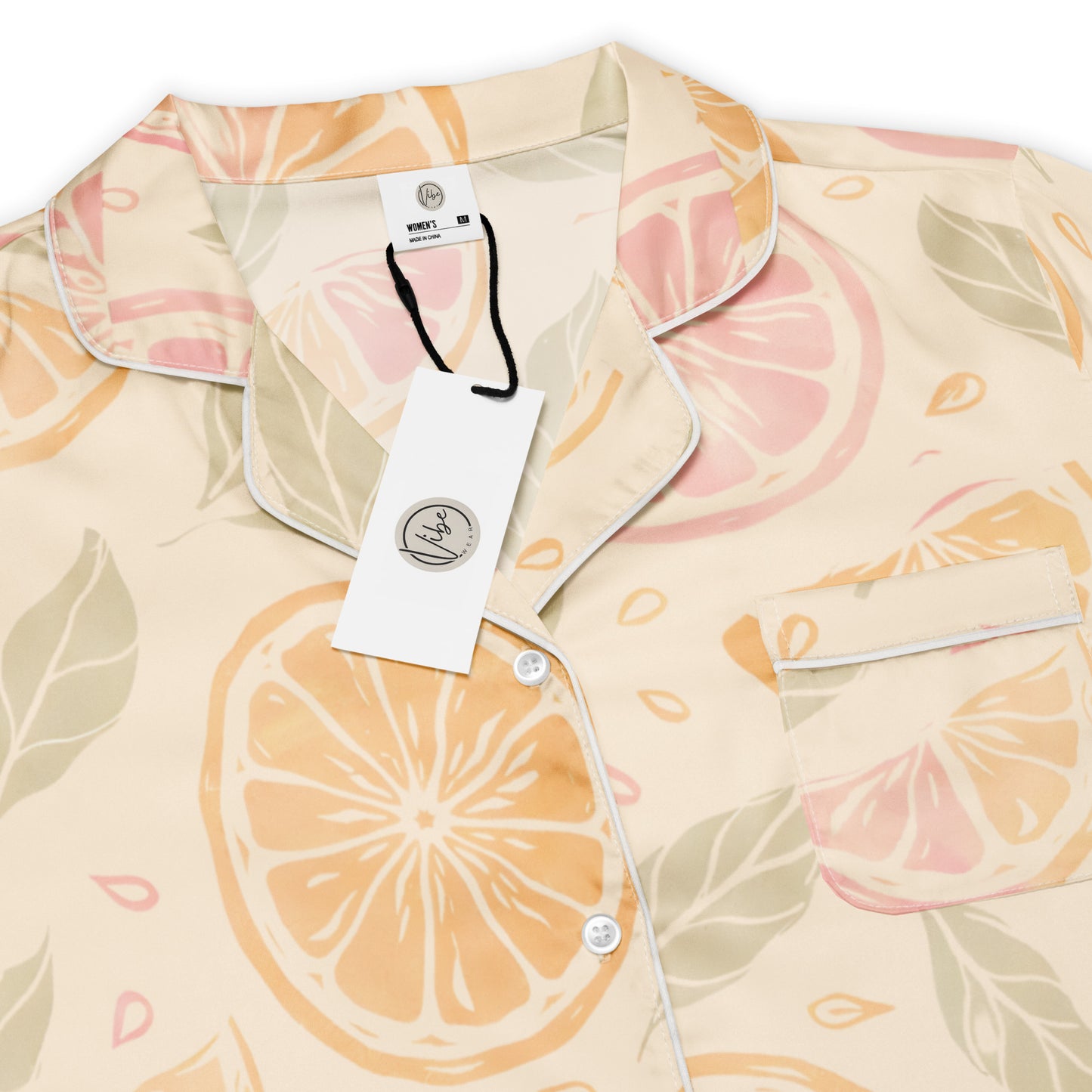 Citrus Glow womens short sleeve pajama top showing citrus slice pattern and button front
