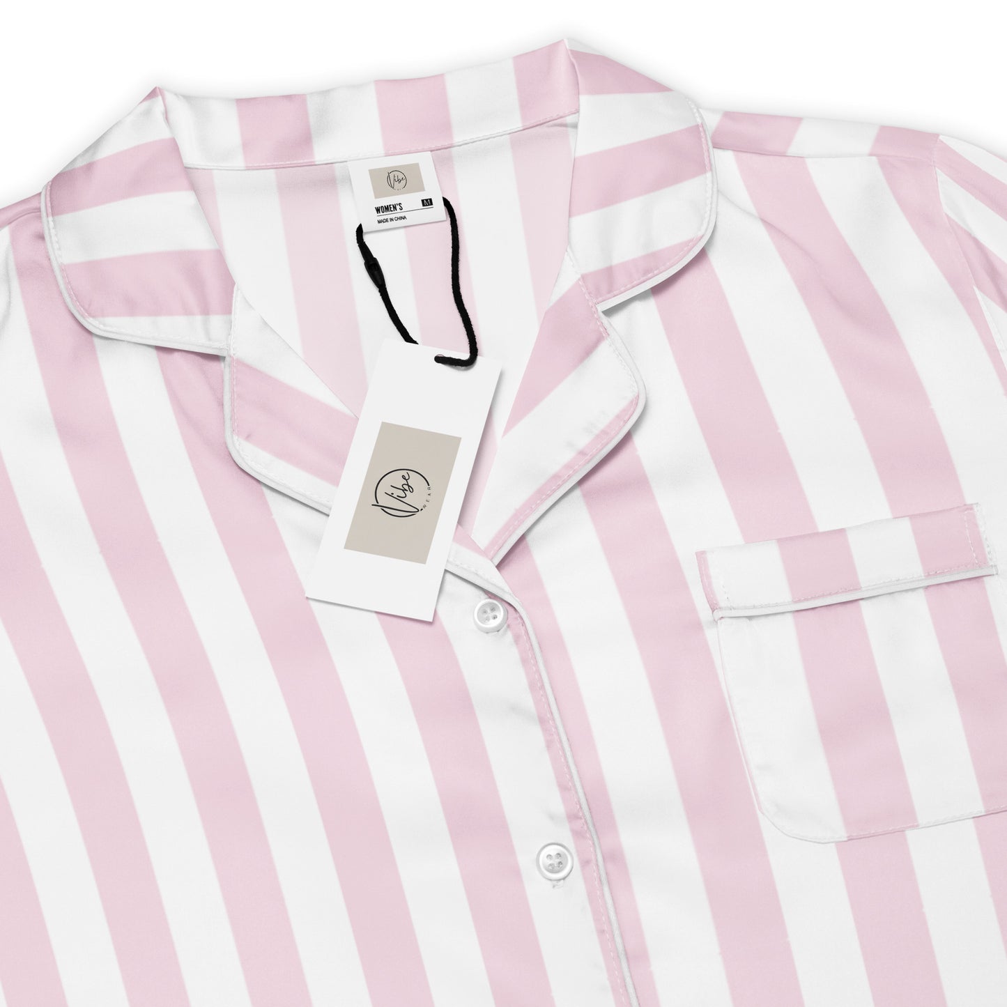 Front view of the Vibewear 'Sorbet Stripes' women's satin pajama top with its pastel pink and white stripe pattern.