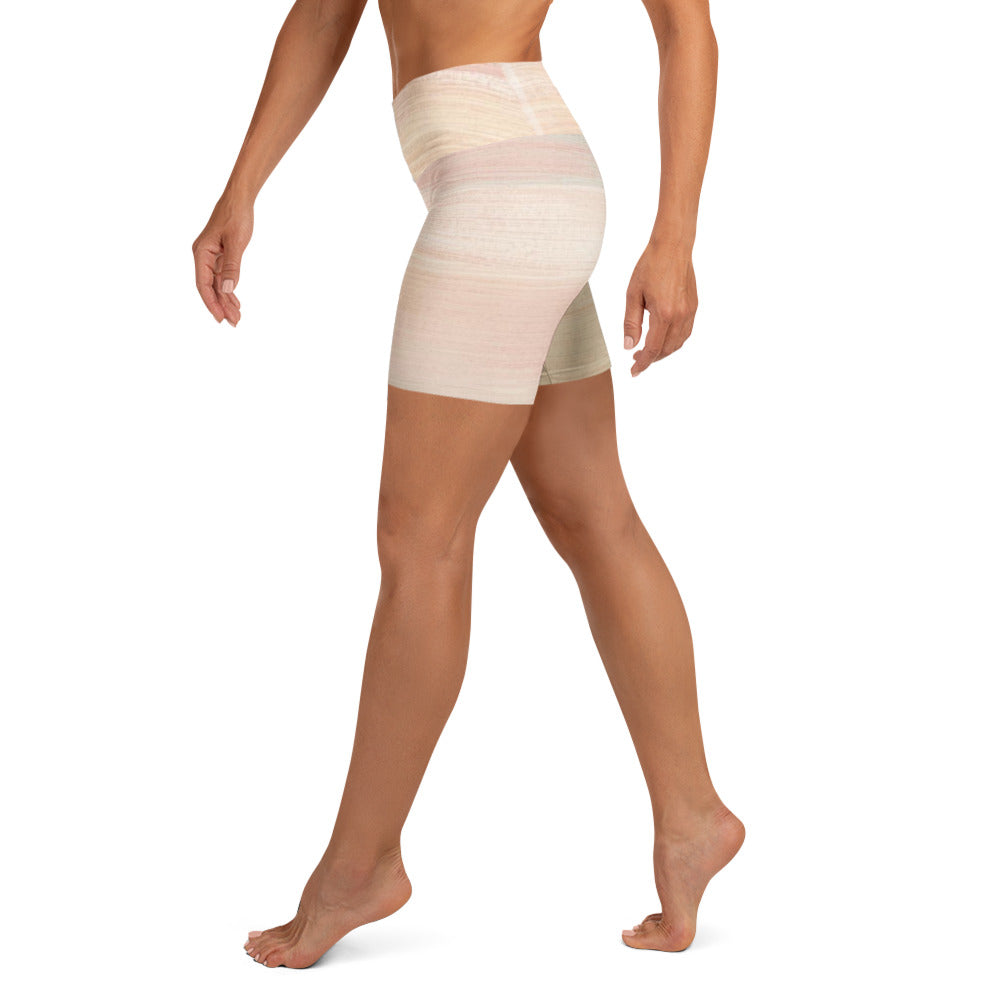 Side view of model wearing Focused high waist yoga shorts in neutral tone