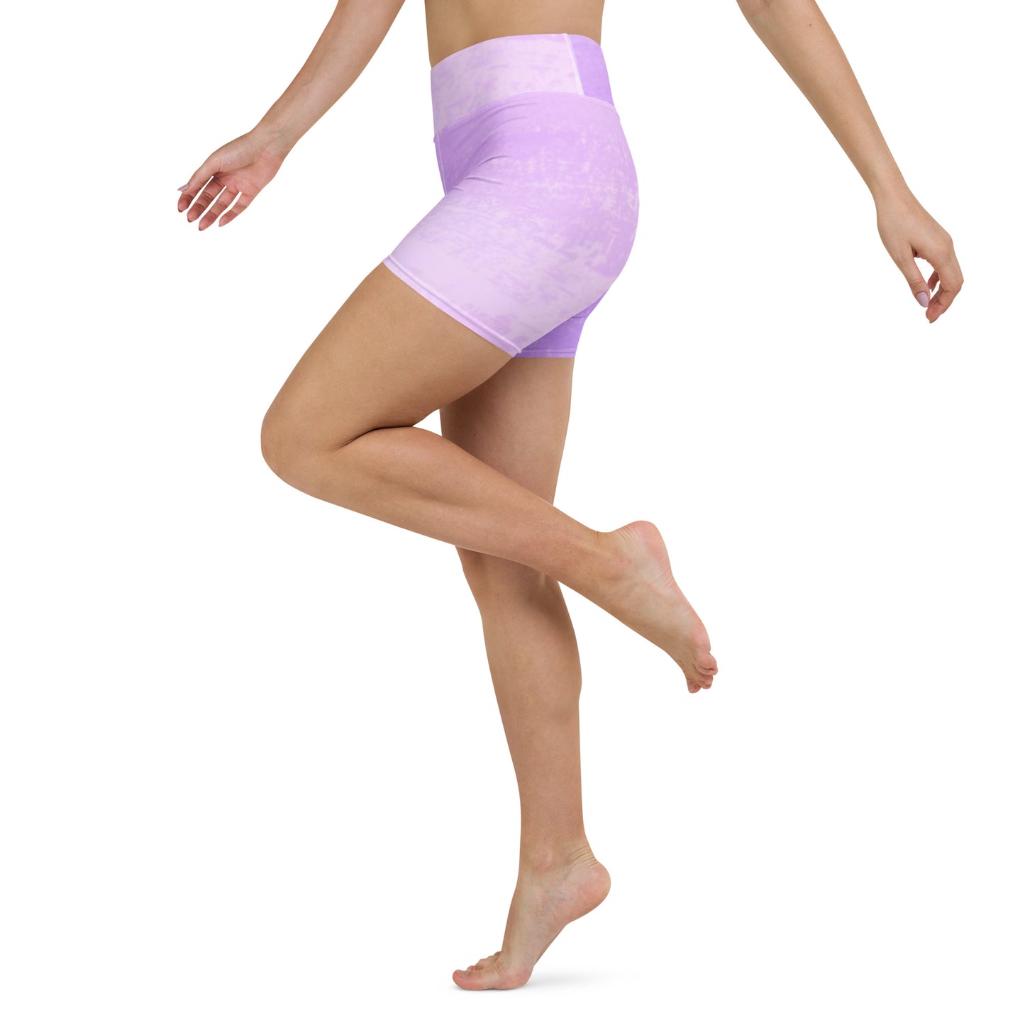 Side view of model wearing Do It For You yoga shorts in purple showing stretch and movement