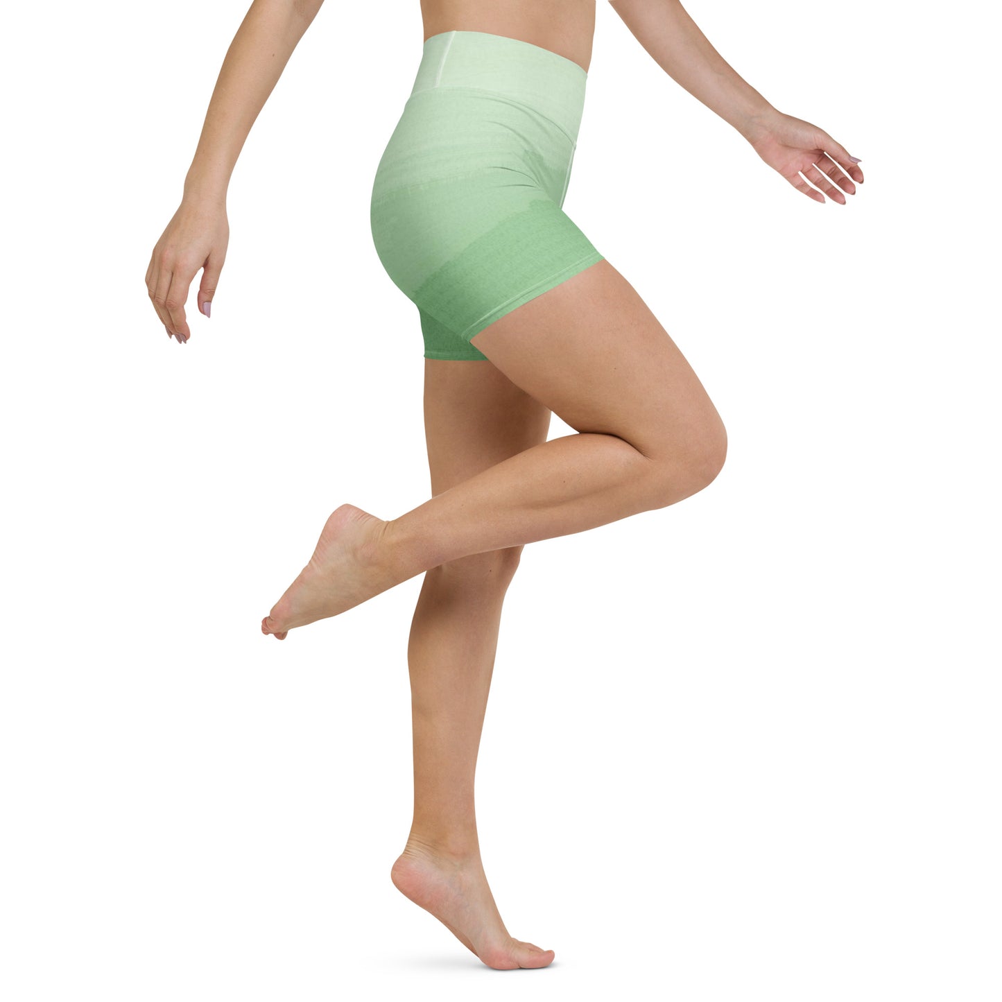 Model wearing Be Your Priority high waist yoga shorts showing stretch and movement