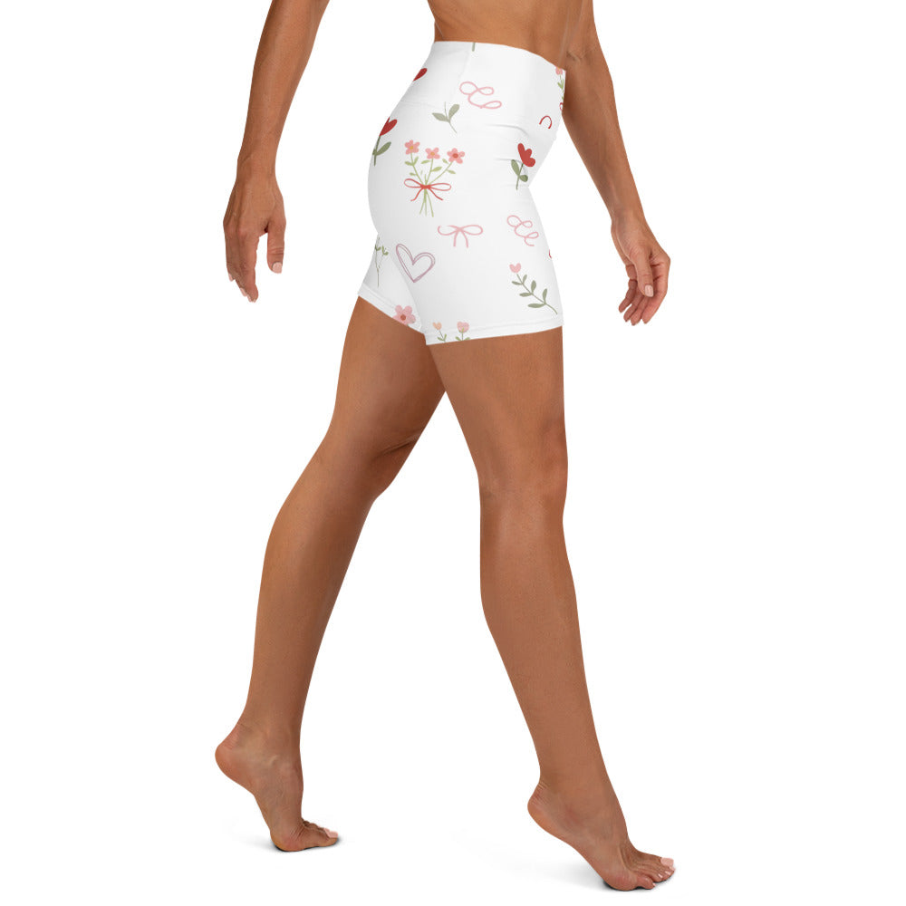 Back view of model wearing Sweet Tied Blooms yoga shorts showing high waist fit and smooth fabric