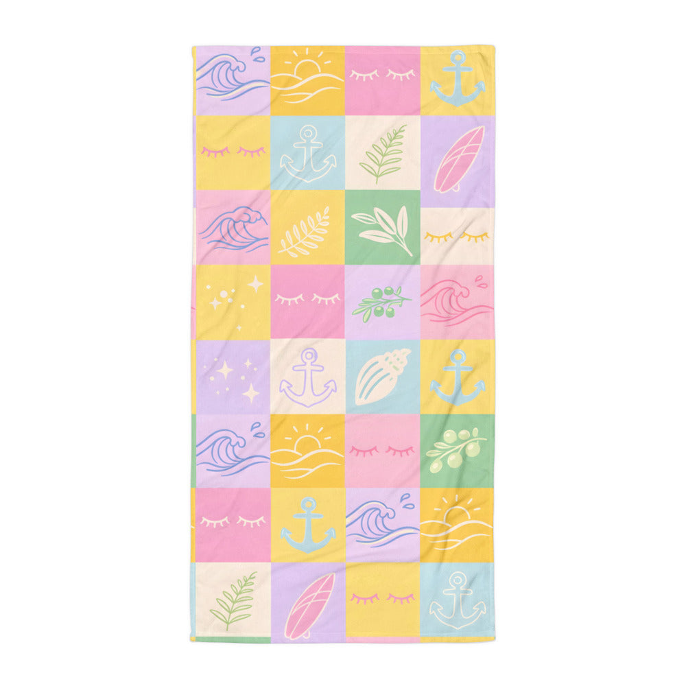Pastel patchwork bath towel with soft colourful square pattern