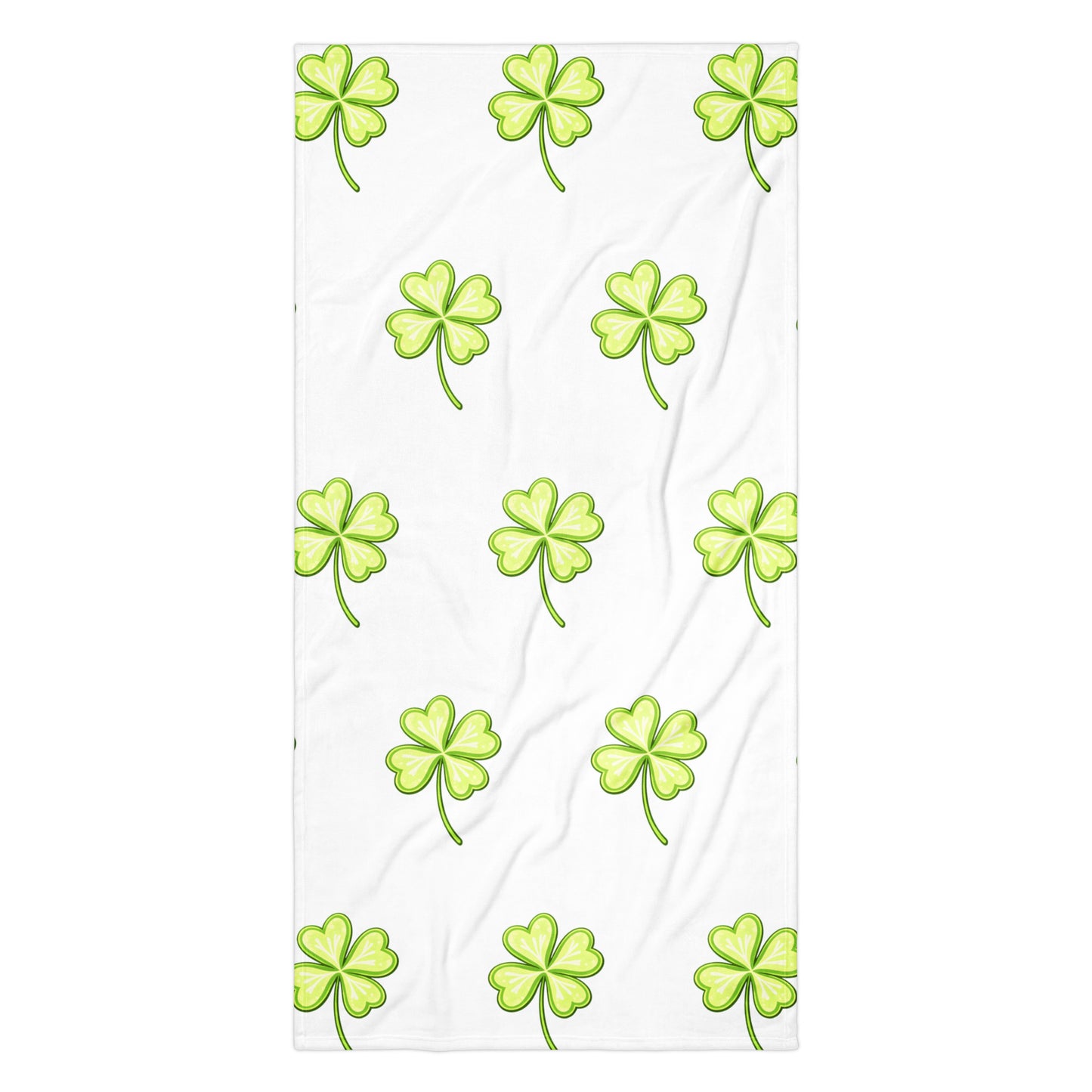 Lucky Clover bath or beach towel with four leaf clover print flat lay view