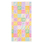 Pastel patchwork bath towel with soft colourful square pattern