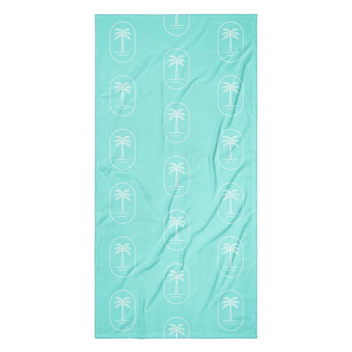 The 'Aqua Palms' towel, displaying the vibrant aqua-blue palm tree pattern