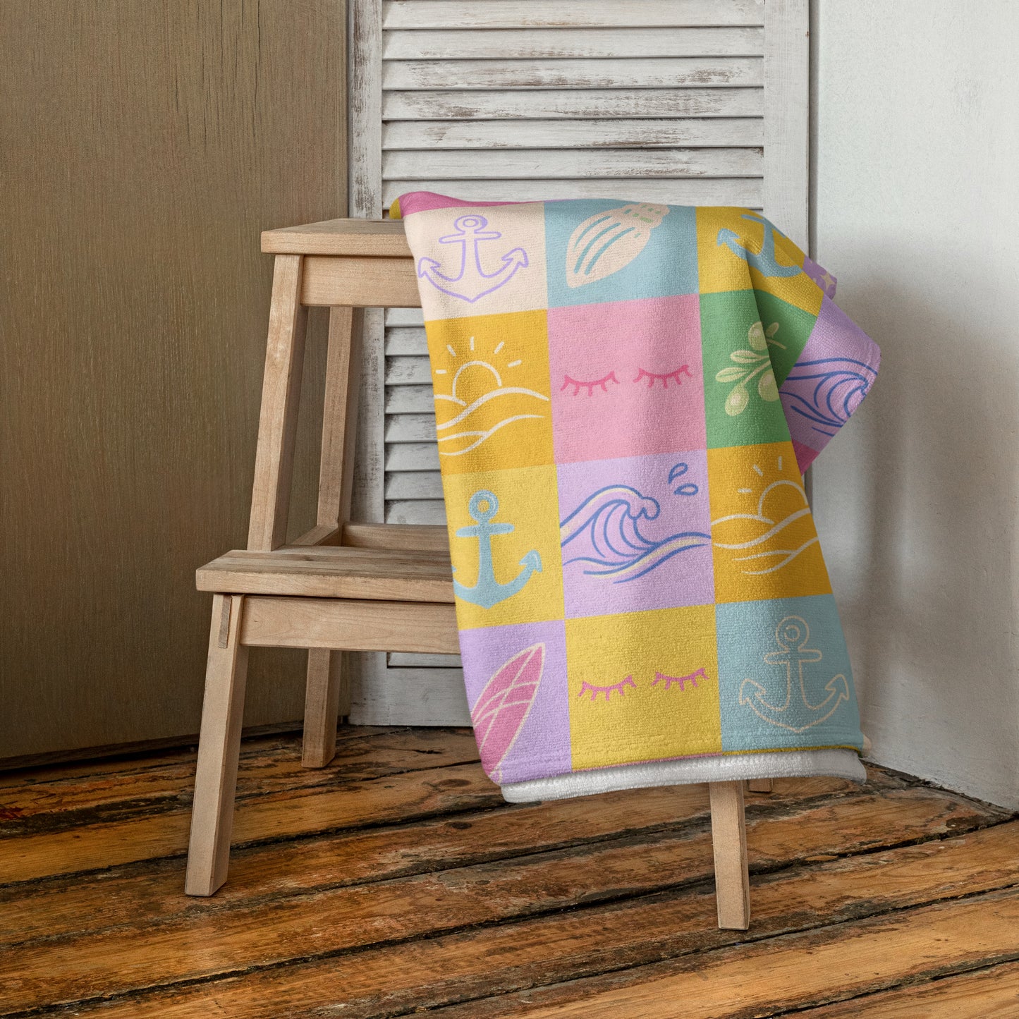 Pastel patchwork bath towel with soft colourful square pattern