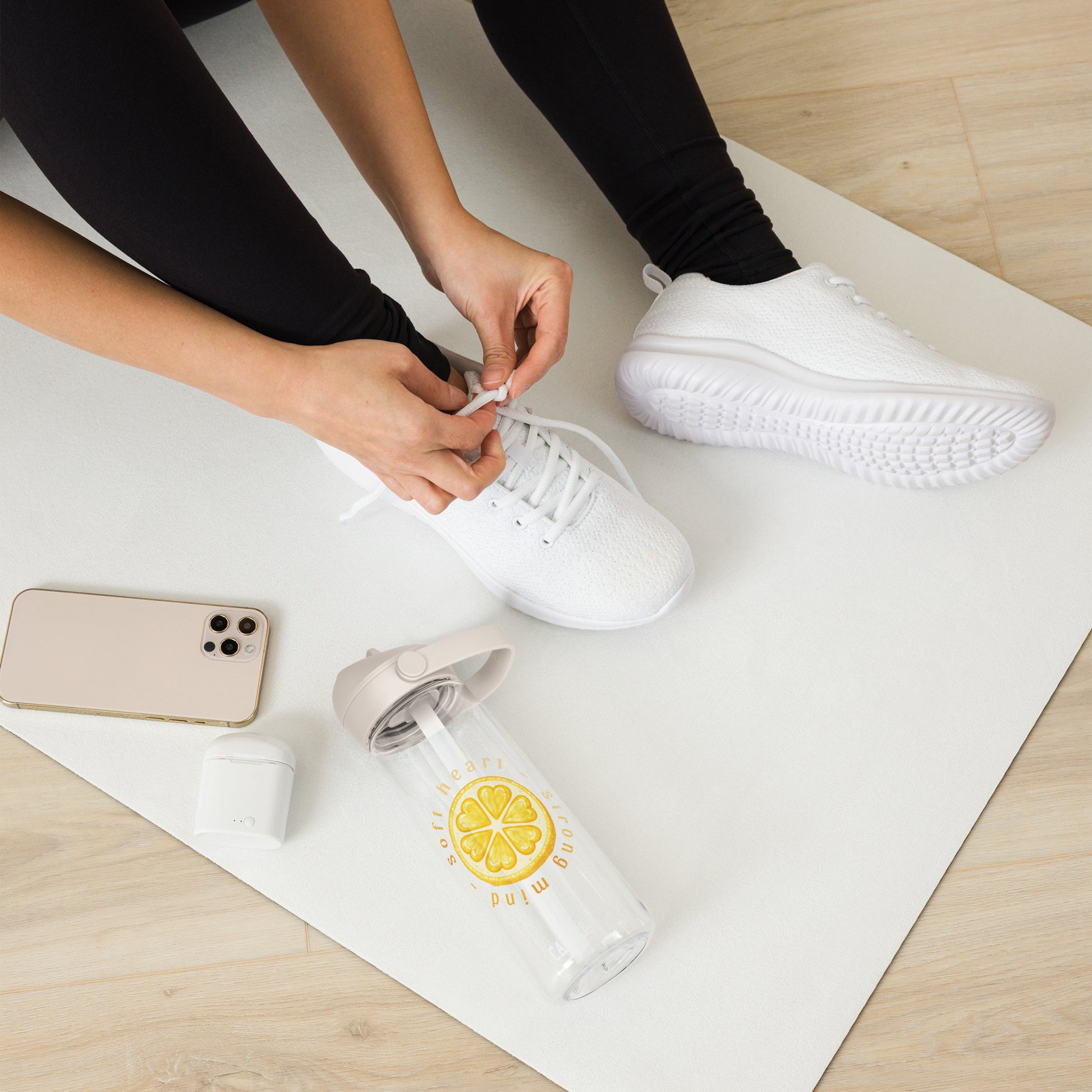Soft Heart Strong Mind flip straw water bottle shown during everyday use