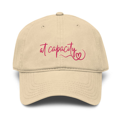 At Capacity washed cotton cap in beige with embroidered text
