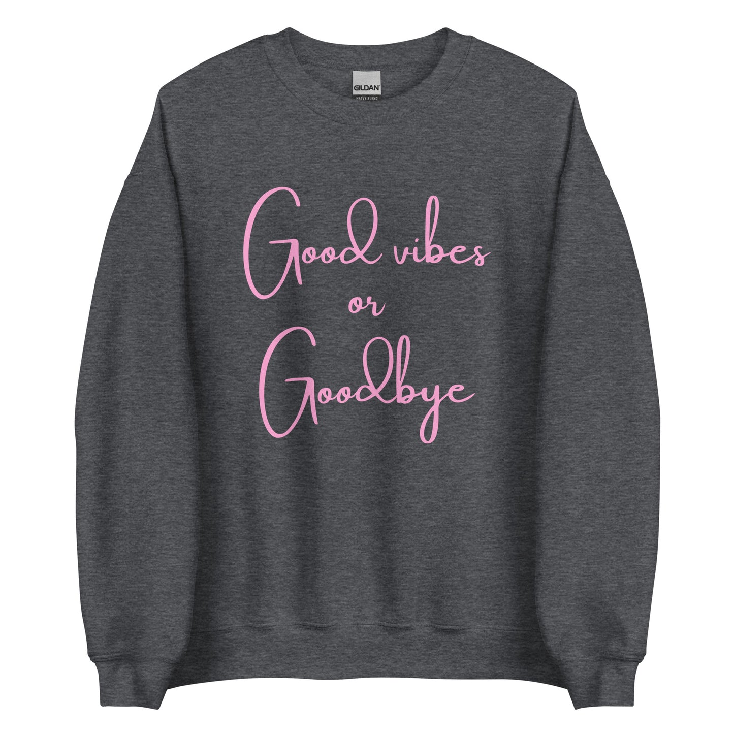 The 'Good Vibes or Goodbye' classic sweatshirt shown in dark grey, with the bold slogan printed in a pink retro-style font across the chest.