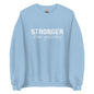The 'Stronger Than Yesterday' classic sweatshirt shown in light blue, with the motivational slogan printed in a bold, white, distressed font across the chest.