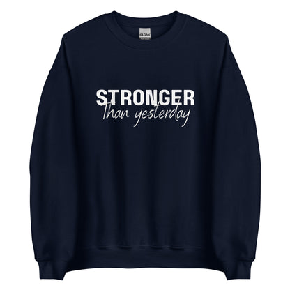 The 'Stronger Than Yesterday' classic sweatshirt shown in Navy blue, with the motivational slogan printed in a bold, white, distressed font across the chest.