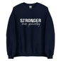 The 'Stronger Than Yesterday' classic sweatshirt shown in Navy blue, with the motivational slogan printed in a bold, white, distressed font across the chest.