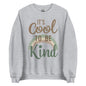 'It's Cool to be Kind' classic sweatshirt, showing the slogan printed in a wavy, retro-style font