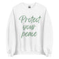 The 'Protect Your Peace' classic sweatshirt shown in white, with the slogan printed in a green retro-style font 