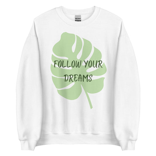 The 'Follow Your Dreams' classic sweatshirt shown in white, with the motivational slogan printed in a white script and sans-serif font across the chest.